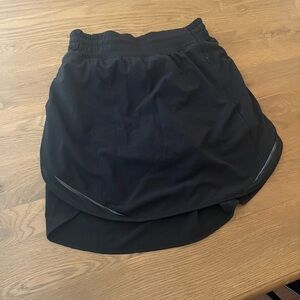 Lululemon Skirt with shorts. Size 4. Black.